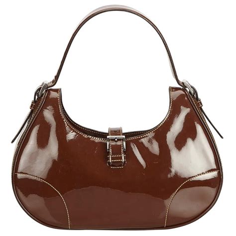 2000s brown prada leather hobo double handle|prada bag 2010.